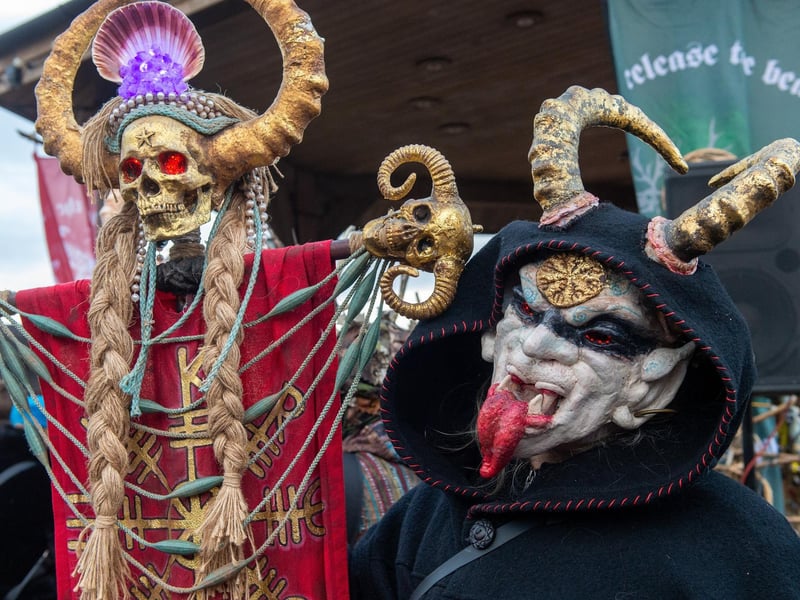 Krampus Run beasties entertain the crowds.
