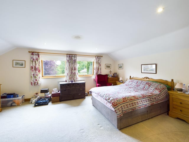 Bedrooms are spacious with plenty of natural light.