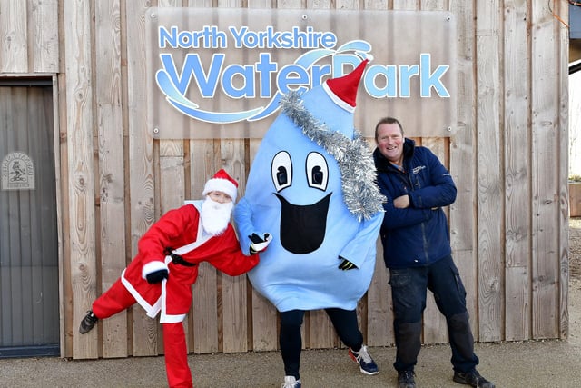 James Whitehead and the Water Park Mascot get ready with Santa
picture: Richard Ponter, 2251350d