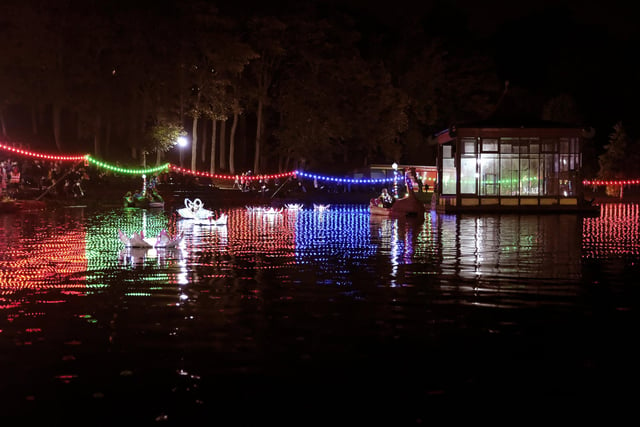 Lights illuminate the lake.