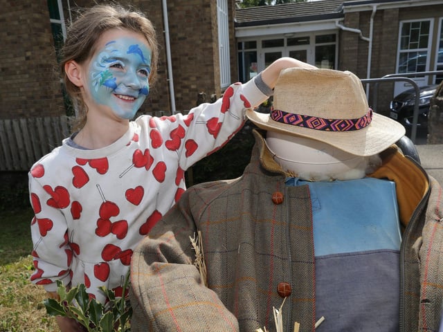 Flora enjoys the scarecrow trail. picture: Richard Ponter