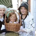 Alice Burdon 14, Sally Burdon 9 and Emma Brockbank 11, at a previous Dickensian Day festival held in Bridlington. Photo: Paul Atkinson PA Press & PR.