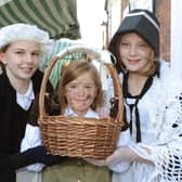 Alice Burdon 14, Sally Burdon 9 and Emma Brockbank 11, at a previous Dickensian Day festival held in Bridlington. Photo: Paul Atkinson PA Press & PR.