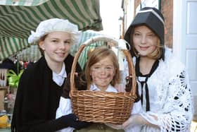 Alice Burdon 14, Sally Burdon 9 and Emma Brockbank 11, at a previous Dickensian Day festival held in Bridlington. Photo: Paul Atkinson PA Press & PR.