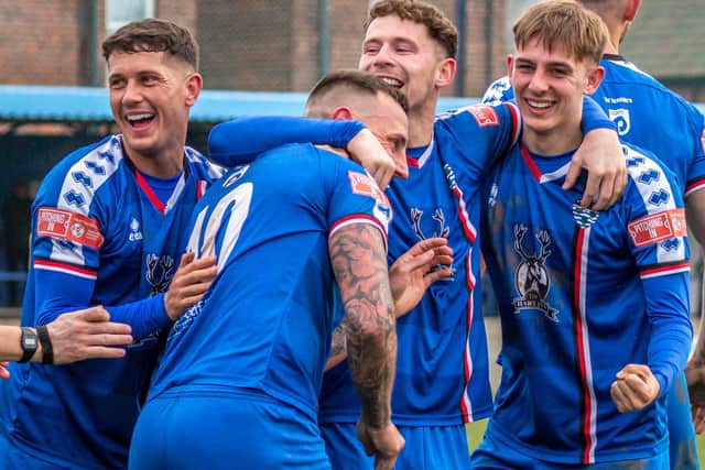 From left, Josef Wheatley, scorer Shaun Tuton, Priestley Griffiths and Liam Braithwaite celebrate during the win against Matlock.