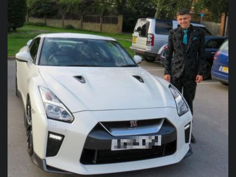 Here is Chase Wingrove looking very smart next to his stunning prom transport.