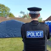 A police cordon remains in place at the scene