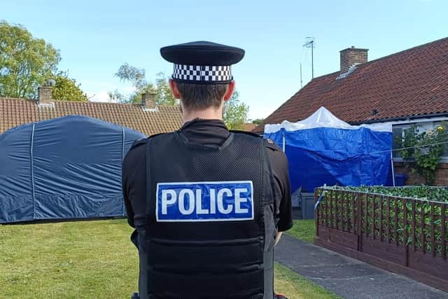 A police cordon remains in place at the scene
