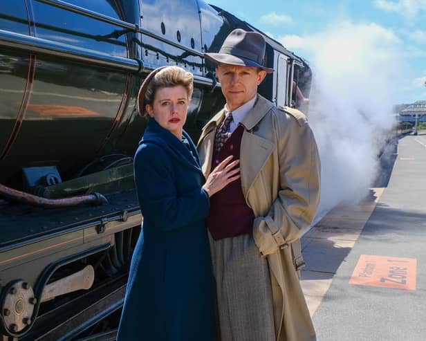 Anne-Marie Piazza and Pete Ashmore, who play Laura and Alec in the Stephen Joseph's production of Brief Encounter, with the LMS Royal Scot Class 46115 Scots Guardsman at Scarborough Railway Station