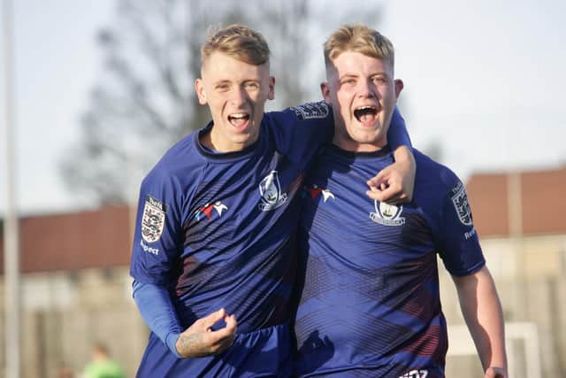 A pair of Bridlington Rovers Millau players celebrate a goal against Cliffe FC.