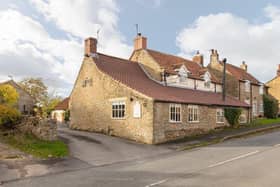 A front view of the property, that stands within 0.4 acres of grounds in a picturesque North Yorkshire village.