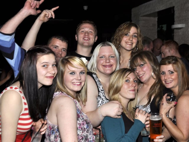 A group of students party away.