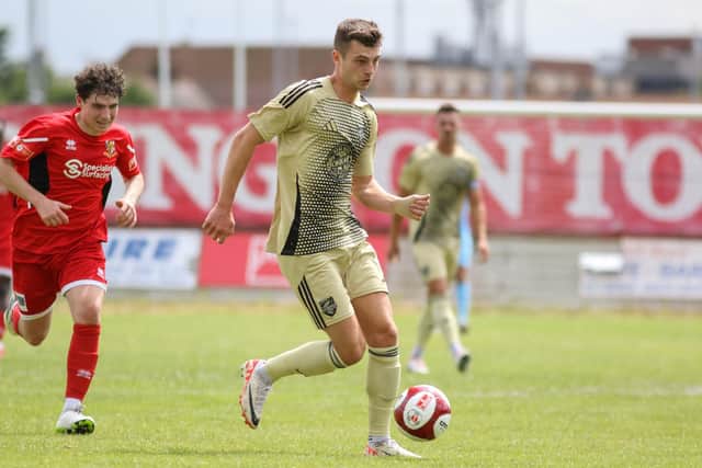 Luca Colville on the run against Brid Town.