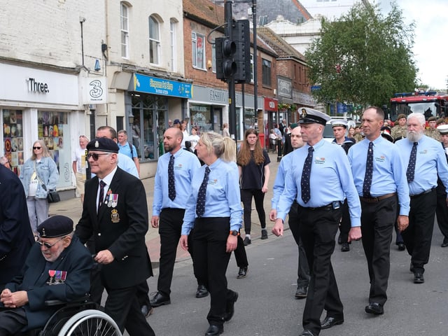 Marching through the town.