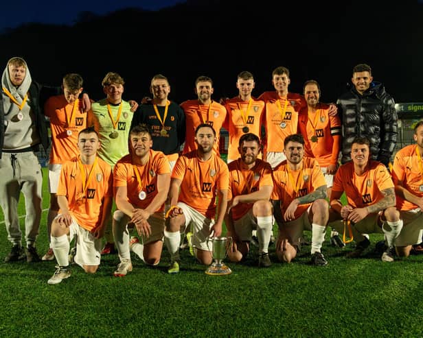 Edgehill show off the Harbour Cup after 6-1 final win against Kirkdale United at the Flamingo Land Stadium. PHOTOS BY JOHN WESTGARTH (WANDERING PHOTOGRAPHY)