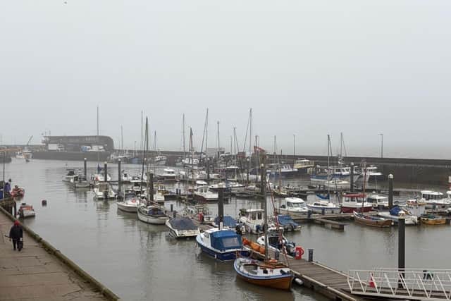 Misty harbour, by Ian Sandy.