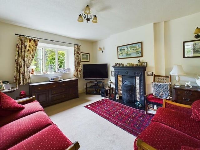 The light and comfortable lounge has a central feature fireplace.