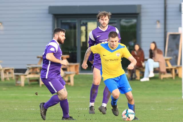 Championship leaders Seamer Sports, yellow and blue kit, are flying high in the ER County League Championship. Photo by TCF Photography