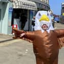Plucky Corey Grieveson, 18, pockets £200 a day prowling Whitby harbour from dawn to dusk in search of the pesky foul, who can knock food out of holiday makers hands.  SWNS