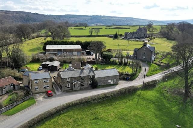 Looking over the property within its rural surroundings.