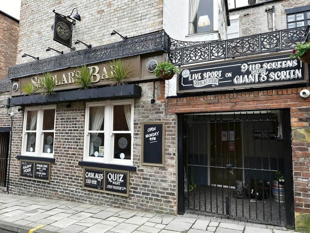 A warm, friendly atmosphere prevails at this busy town- centre pub at the rear of the main shopping centre. The large front bar is dominated by TV screens showing major sporting events, and there is a smaller games area to the left rear of the bar.