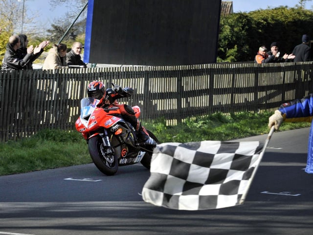 Ryan Farquhar celebrates winning the Northern 600, in the Ian Watson Spring Cup race meeting, in 2012.