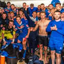 Whitby Town players and staff celebrate their FA Cup fourth qualifying round replay win at home to Chelmsford City. PHOTOS BY BRIAN MURFIELD