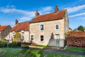 The Georgian house stands well within the village of Thornton le Dale.