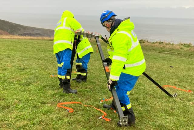 Team members from Staithes Coastguard, Redcar Coastguard Rescue Team and Whitby Coastguard at a training session with a full-time officer on the clifftop at Port Mulgrave.