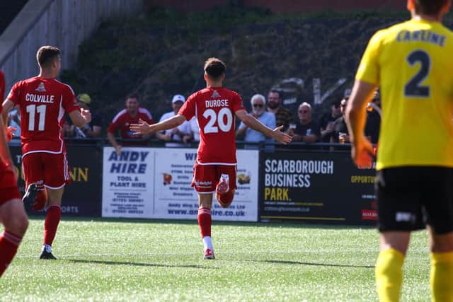Curtis Durose races away after scoring the opener for Boro against Brackley.