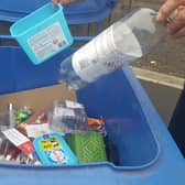 East Riding council is asking people to empty and rinse containers before they go in the blue bin.