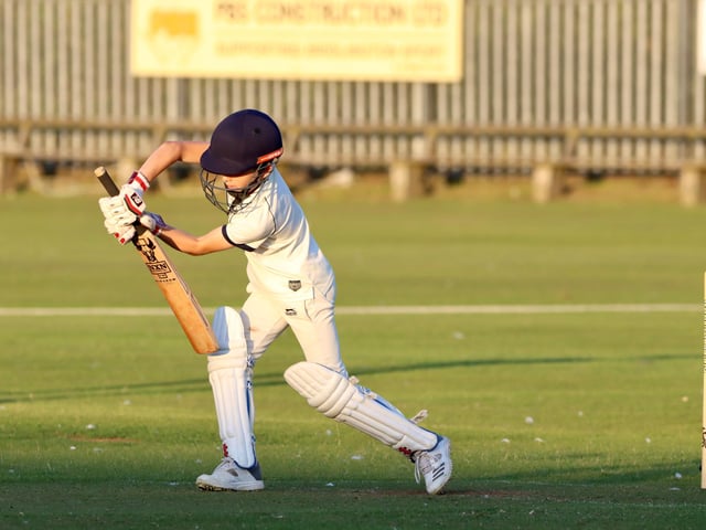A batter defends their wicket.