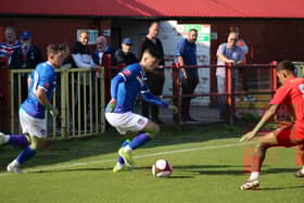 Whitby Town on the attack against Workington in the NPL Premier Division on Saturday.
