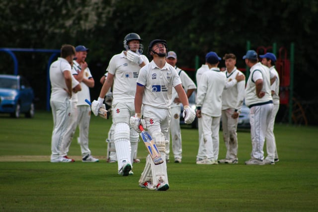 A Sherburn batsman shows his dismay after being dismissed.