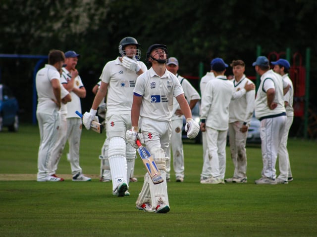 A Sherburn batsman shows his dismay after being dismissed.