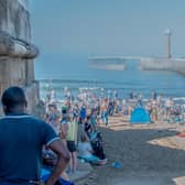 Crowds enjoying the beach at Whitby Regatta.