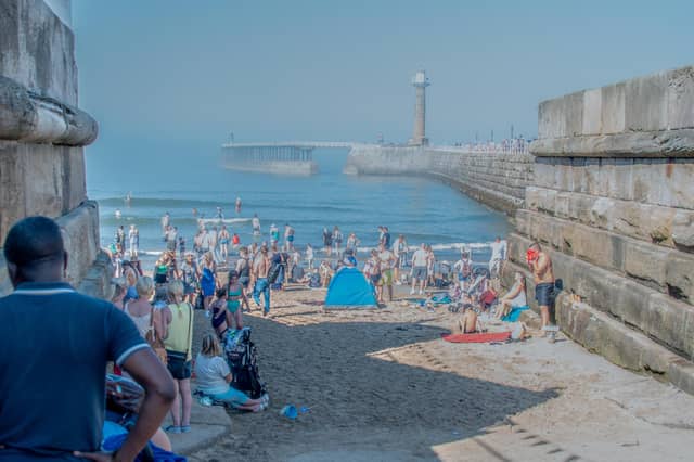 Crowds enjoying the beach at Whitby Regatta.