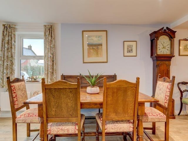Dining space allows for a larger style table and chairs.