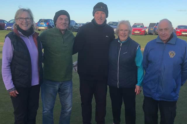 From left, Tea & Biscuits winners Pauline Allison & Geoff Leatherland, Robin Hood's Bay Competition Secretary Tim Purcell, runners-up Daphne Fewster & Dave Moment.