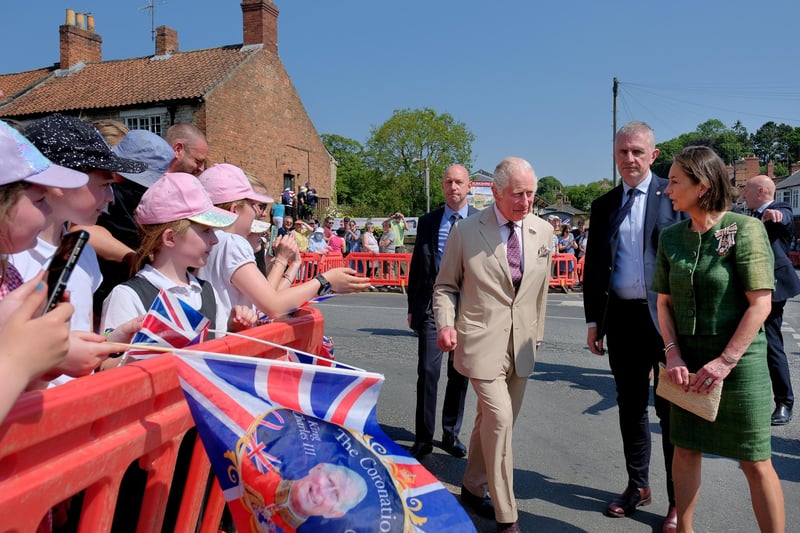 Children greet the King in Pickering
