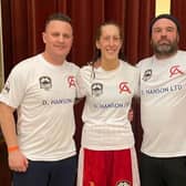 Chelsea Arnell with her coaching team