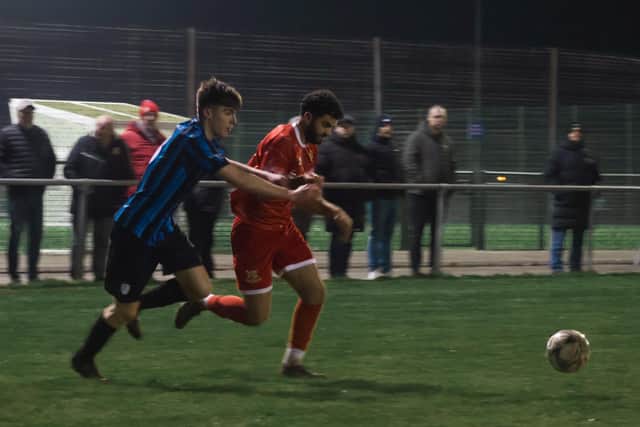 Ahmed Salam on the run against Reckitts. Photo by ecmedia