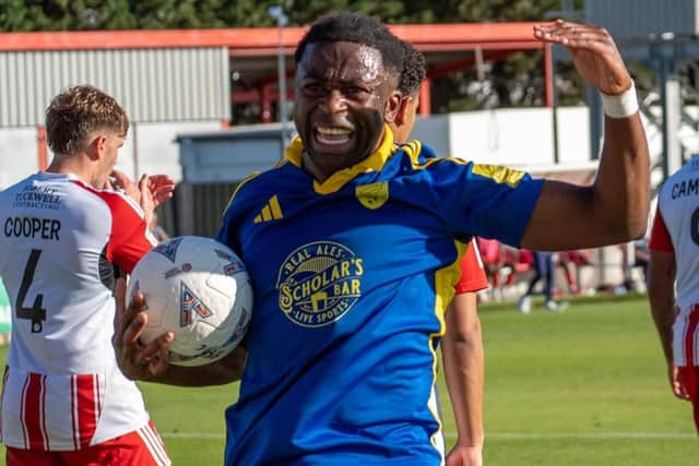 Kieran Weledji rallies the Boro fans after netting the equaliser at Brackley. Photo by Wilkins Photography