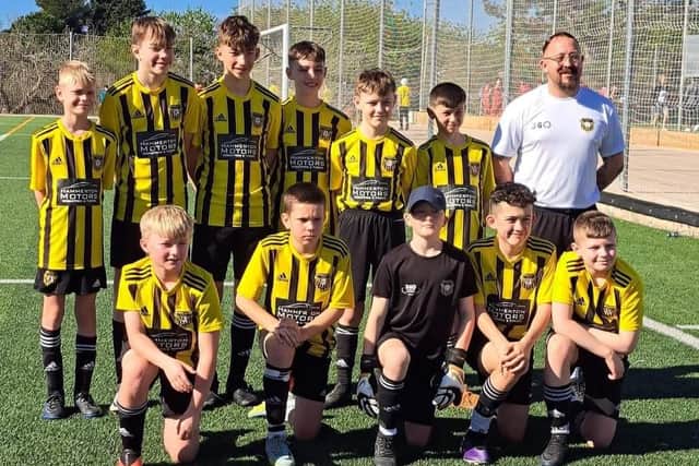 The Under-12s Hawkes 360 AFC team line up at the Copa Daurada.
