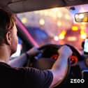 Man driving car.