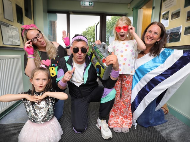 Headteacher Mr England and team in fantastic outfits!