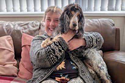 Lisa Davis and Hattie the dog appealing for eye surgery donations.