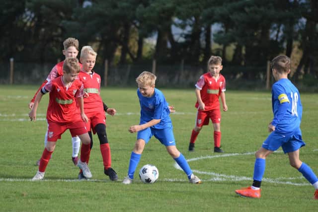 The new Heslerton Under-11s Huskies team in action against Scarborough Athletic.
