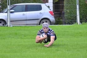Ed Wraith dives in for Pocklington RUFC's third try against Hullensians in their victory on Saturday afternoon. PHOTO BY ANDY NELSON