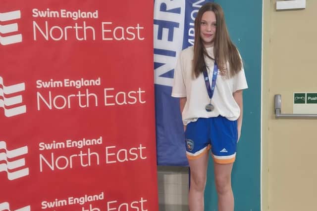 Kingfishers SC member Genie Martin earned a silver medal at the 50m Butterfly at the North Eastern Regional Long Course Championships.